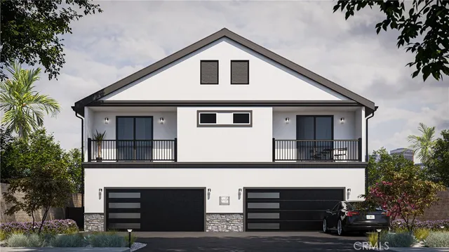 a front view of a house with garage