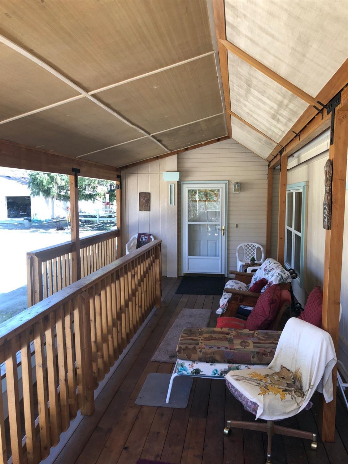 451 Boyer Road Grants Pass, OR 97526 - Photo 5 of 25 a living room with furniture and a window