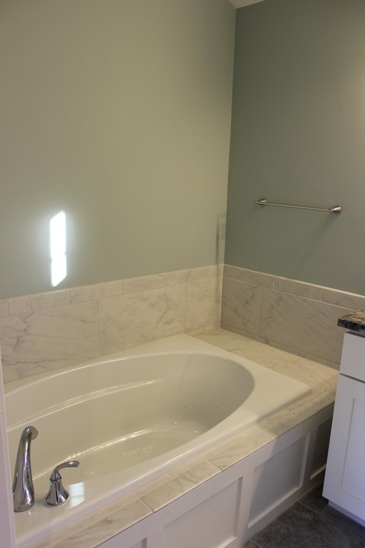 2 Silverbirch Road Billerica, MA 01821 - Photo 13 of 24 a bathroom with a bathtub