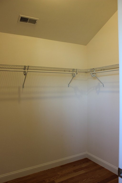 2 Silverbirch Road Billerica, MA 01821 - Photo 14 of 24 a view of a room with racks on the wall