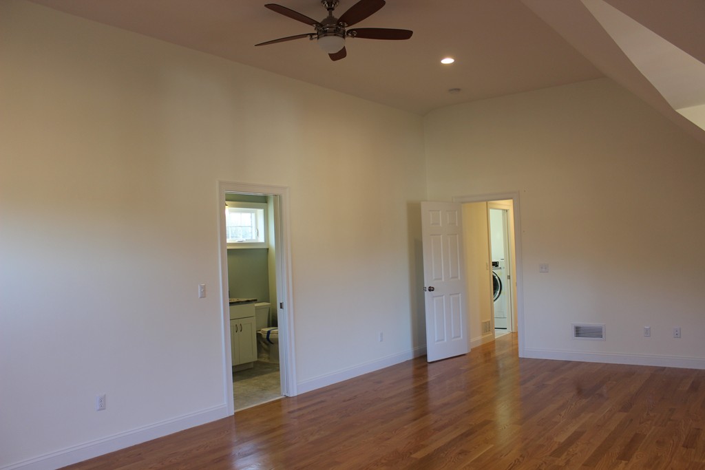 2 Silverbirch Road Billerica, MA 01821 - Photo 16 of 24 wooden floor in an empty room with a window
