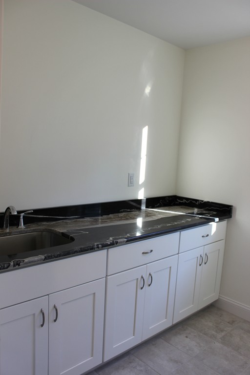 2 Silverbirch Road Billerica, MA 01821 - Photo 17 of 24 a close view of cabinets and sink