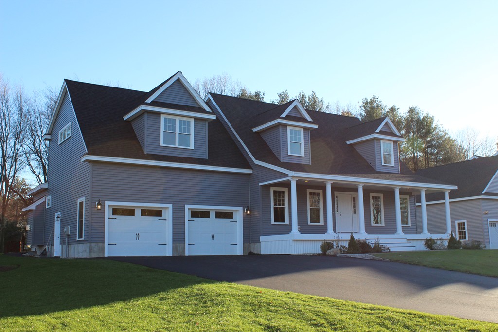 2 Silverbirch Road Billerica, MA 01821 - Photo 2 of 24 a front view of a house with a yard