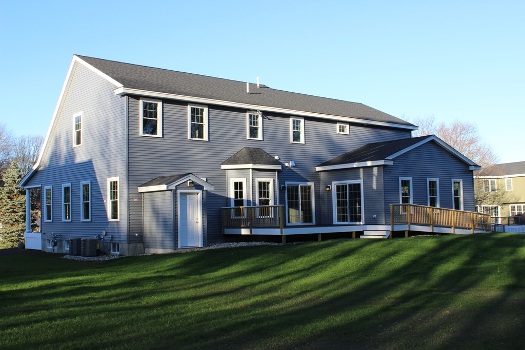 2 Silverbirch Road Billerica, MA 01821 - Photo 23 of 24 a front view of a house with a garden
