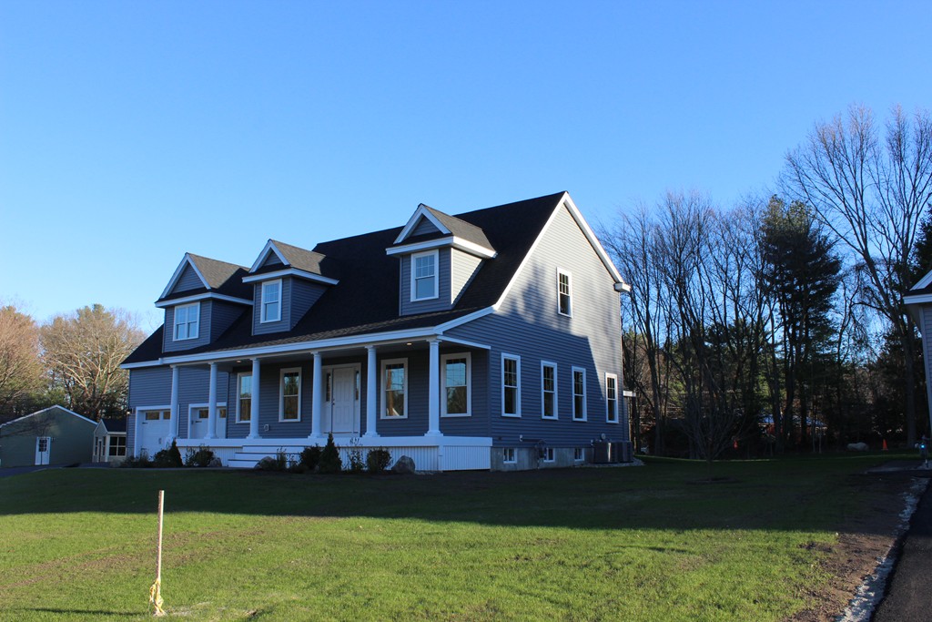 2 Silverbirch Road Billerica, MA 01821 - Photo 3 of 24 a front view of a house with a garden