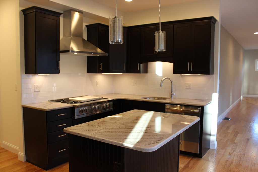 2 Silverbirch Road Billerica, MA 01821 - Photo 4 of 24 a kitchen with a sink and a refrigerator