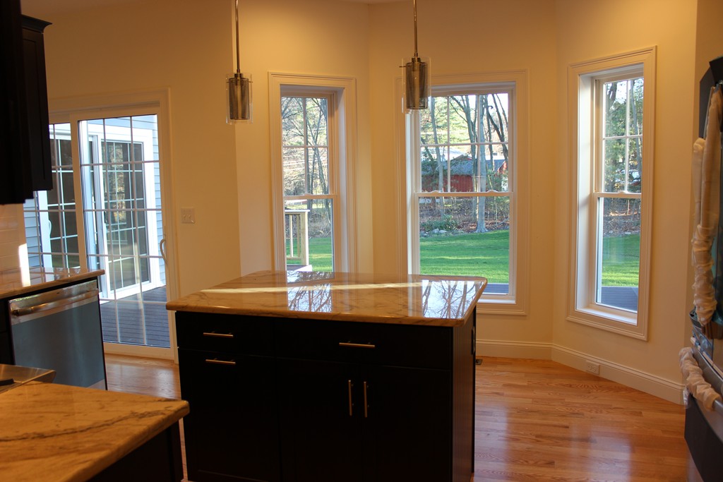 2 Silverbirch Road Billerica, MA 01821 - Photo 6 of 24 a view of a kitchen counter top space and windows