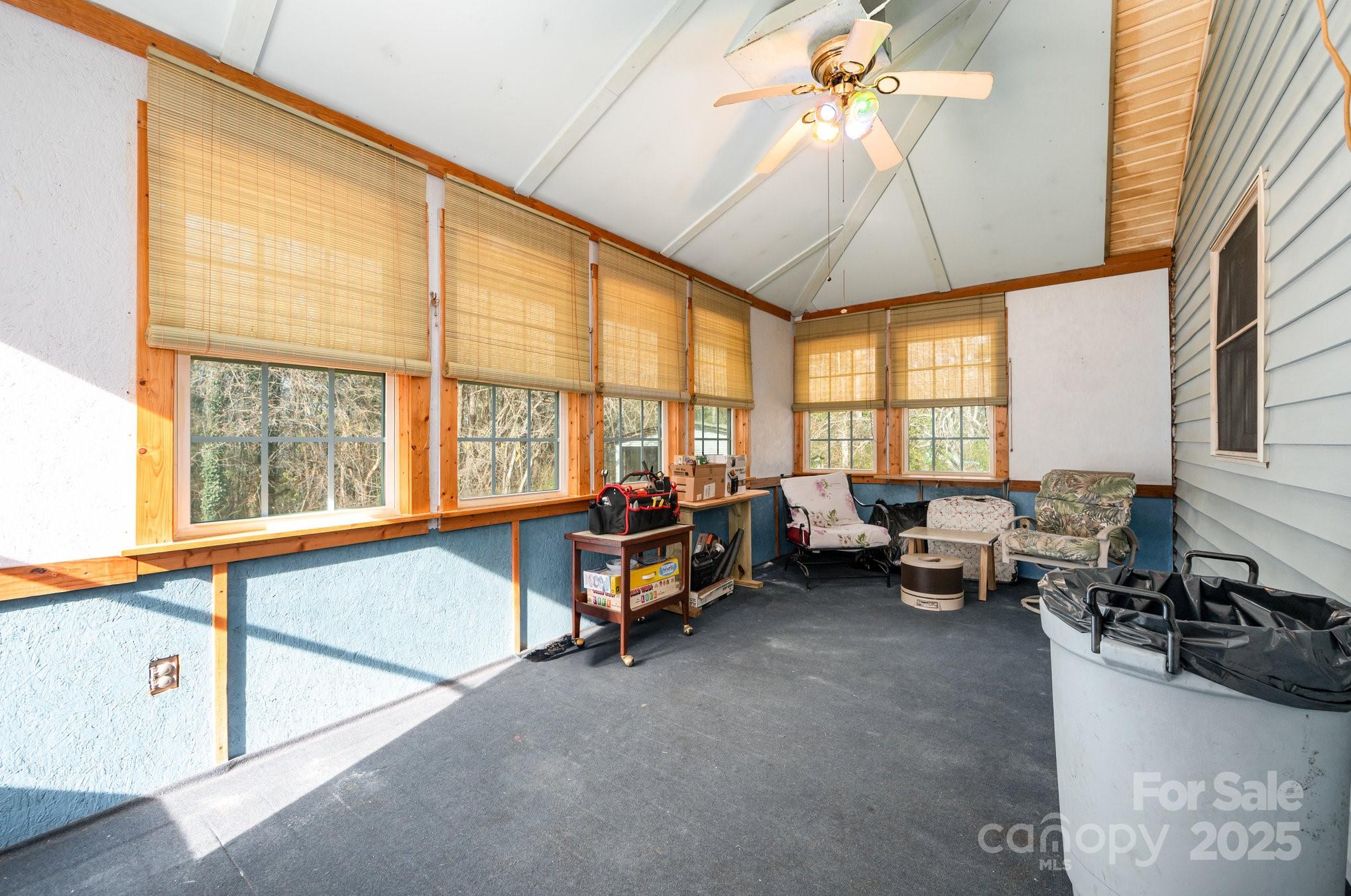 9595 Mt Olive Road Mount Pleasant, NC 28124 - Photo 16 of 26 a living room with furniture and a large window