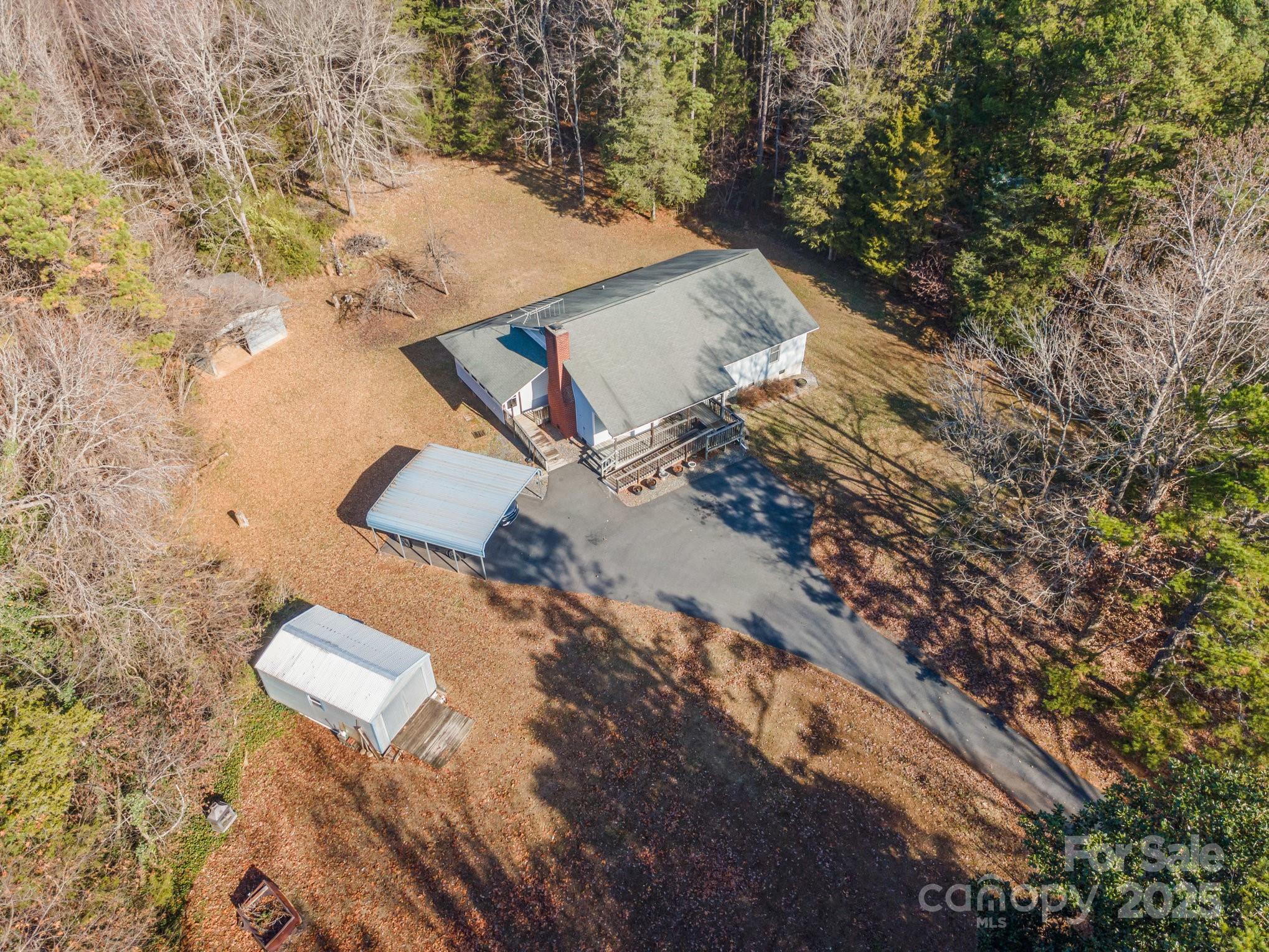 9595 Mt Olive Road Mount Pleasant, NC 28124 - Photo 23 of 26 an aerial view of house with yard