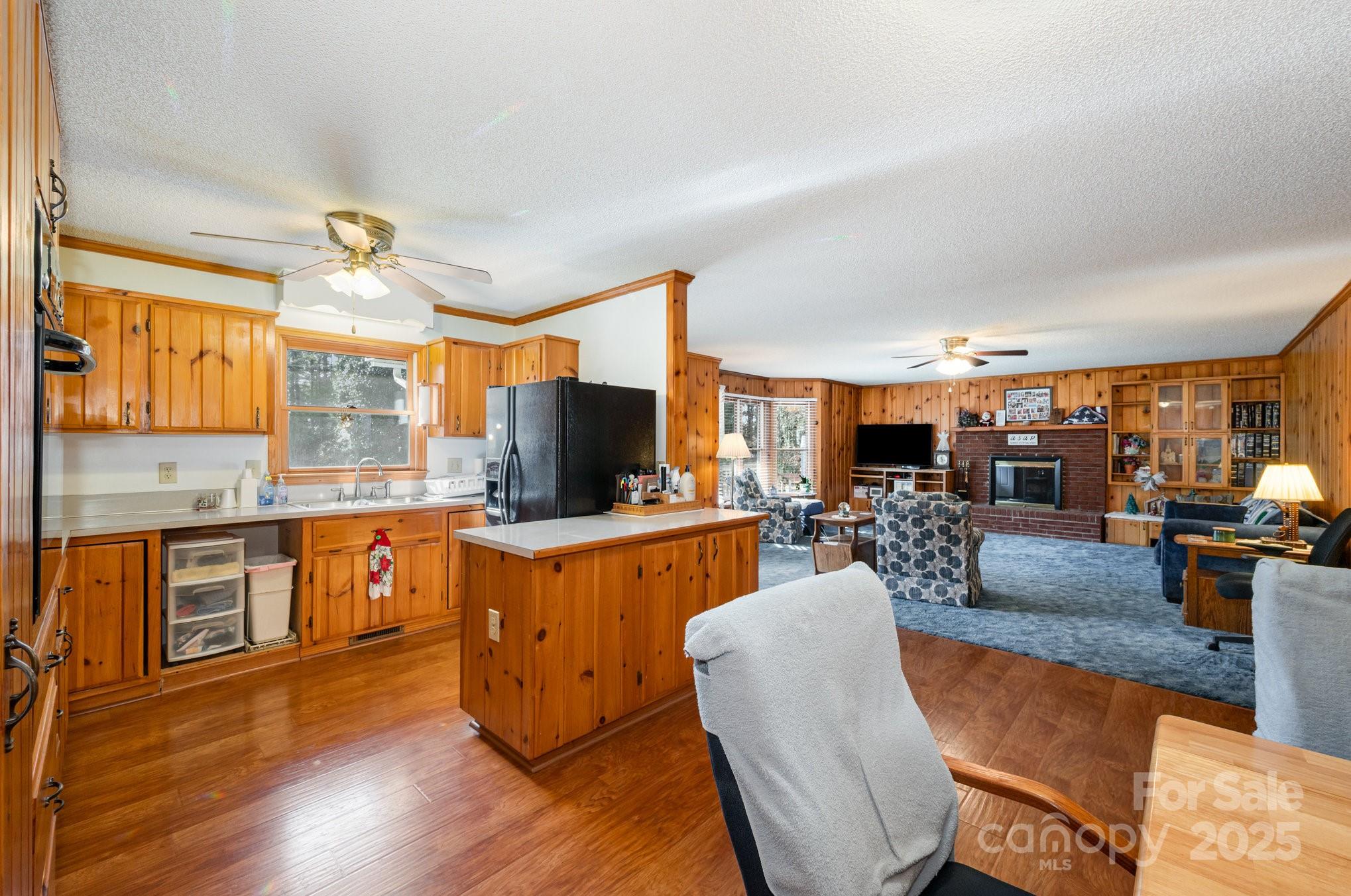 9595 Mt Olive Road Mount Pleasant, NC 28124 - Photo 7 of 26 a kitchen with stainless steel appliances kitchen island granite countertop a sink and cabinets