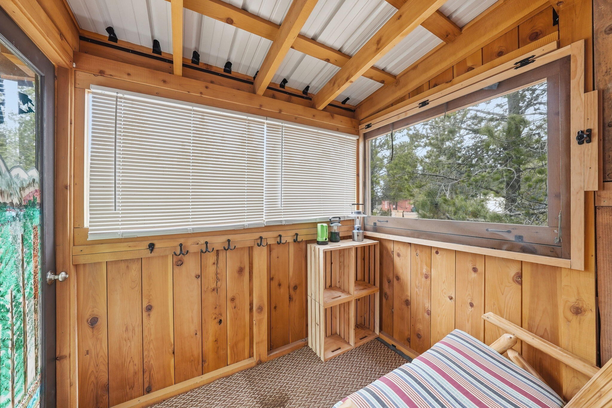 54270 Huntington Road La Pine, OR 97739 - Photo 46 of 68 a view of a porch with wooden floor and furniture