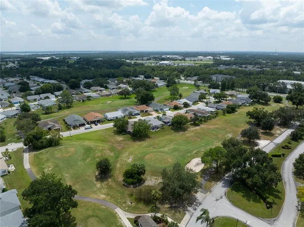 an aerial view of a house with a garden