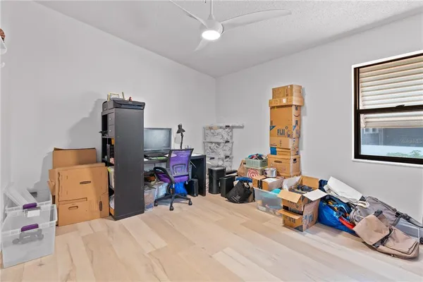 a bedroom with furniture and a bed