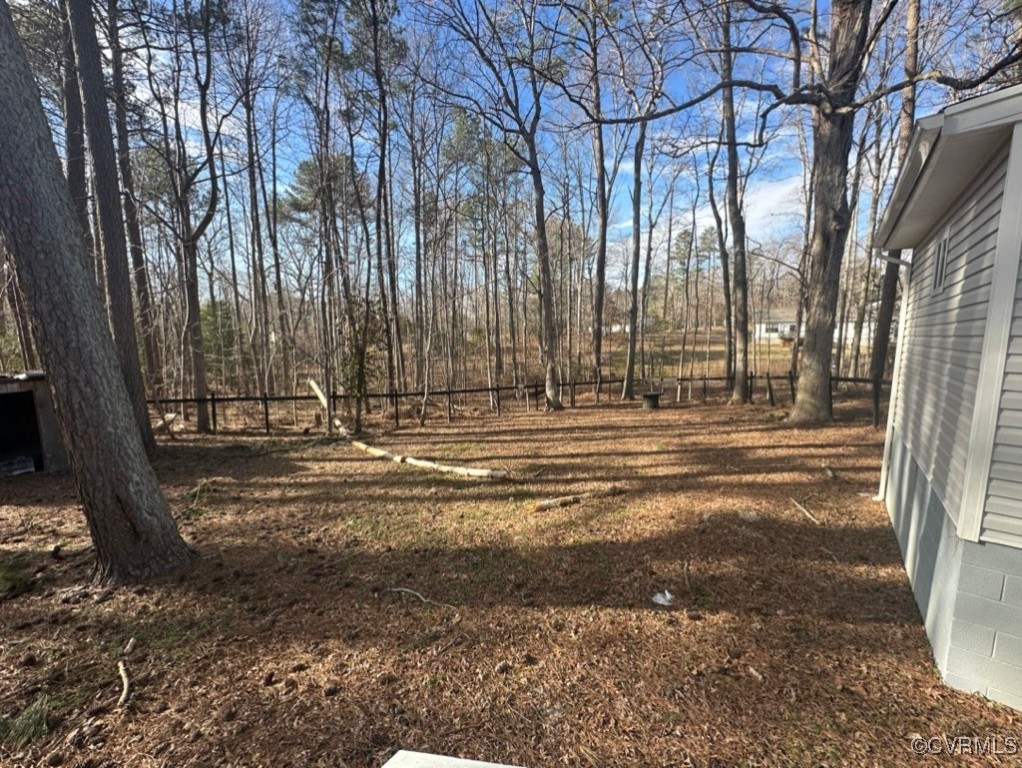 15810 Saddlebrook Road Chesterfield, VA 23838 - Photo 8 of 9 a view of a yard with large trees