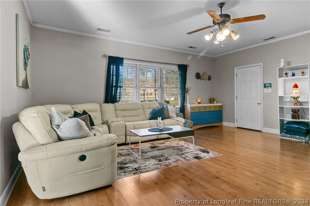 108 Mckinnon Drive Rockingham, NC 28379 - Photo 17 of 34 a living room with furniture and a large window