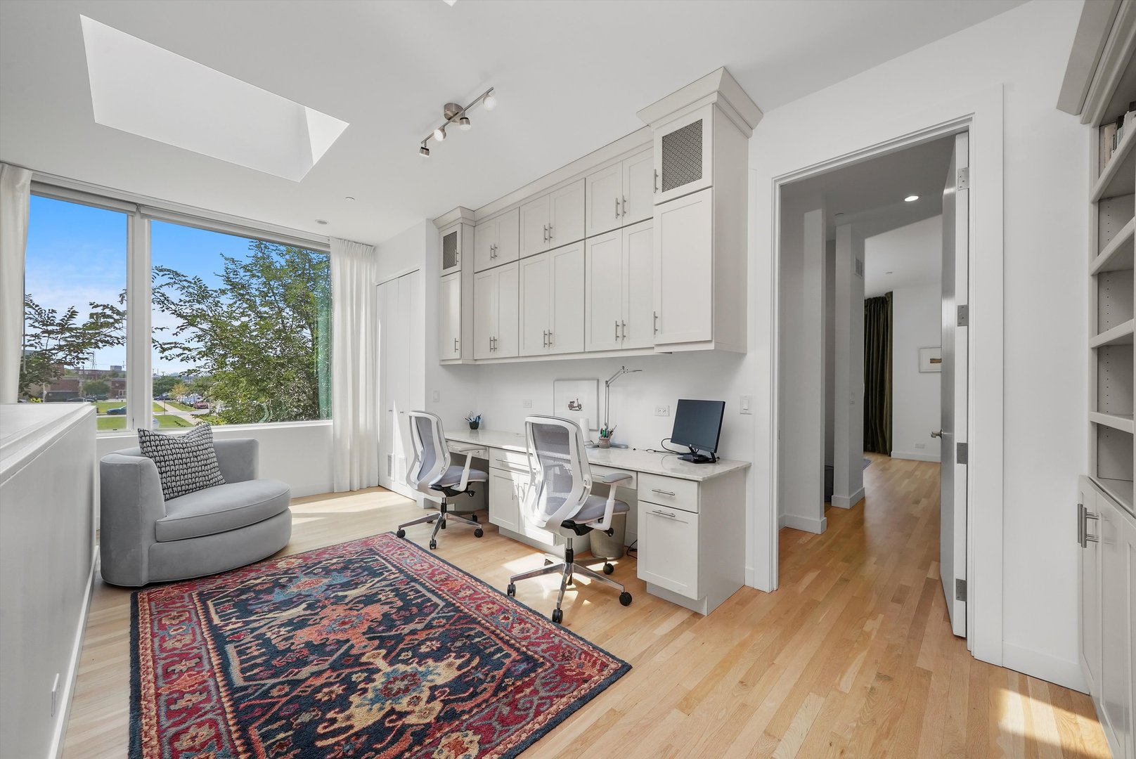 459 West Hobbie Street Chicago, IL 60610 - Photo 19 of 47 a living room with furniture wooden floor and a rug