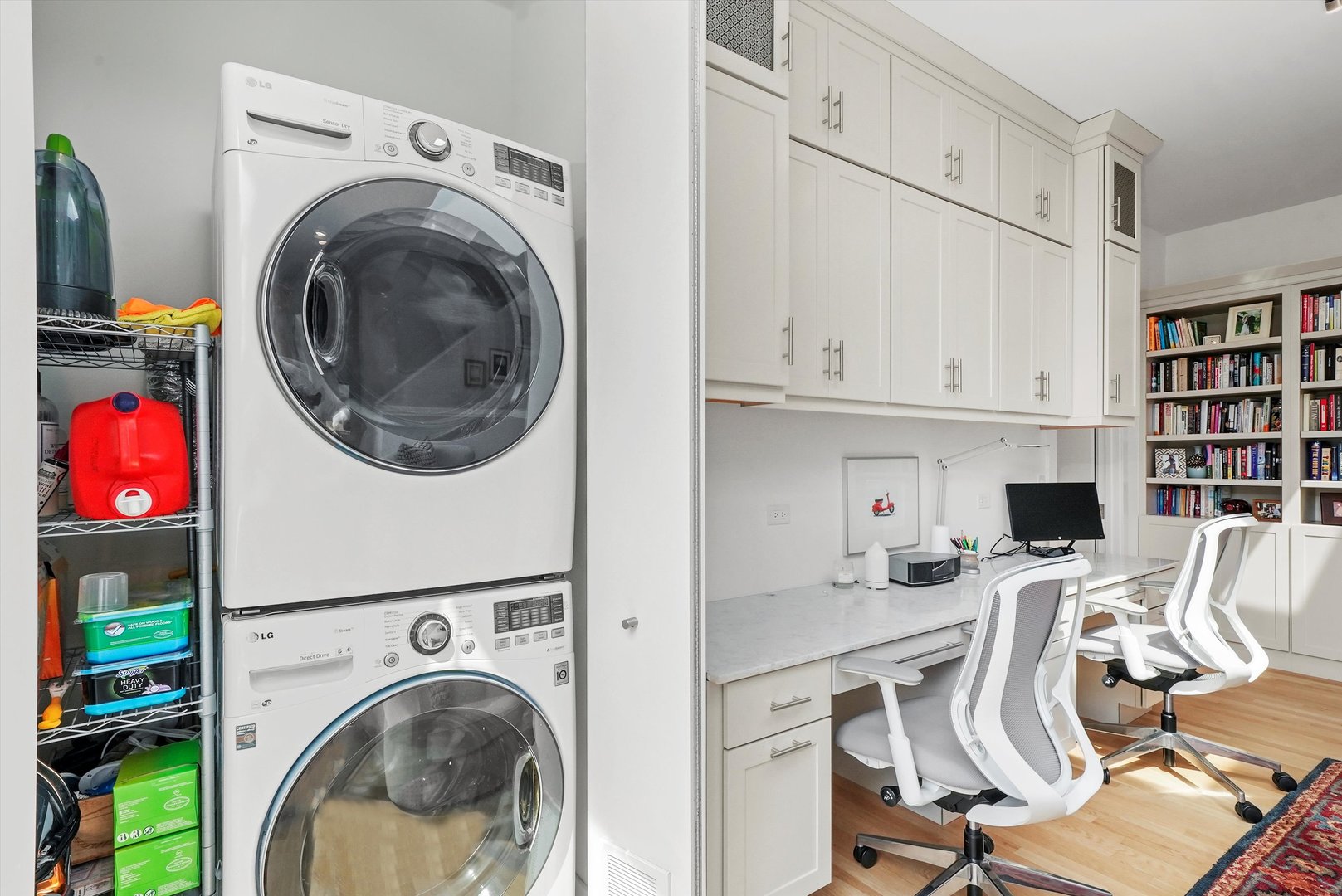 459 West Hobbie Street Chicago, IL 60610 - Photo 22 of 47 a view of a kitchen with stainless steel appliances cabinets and a book shelf