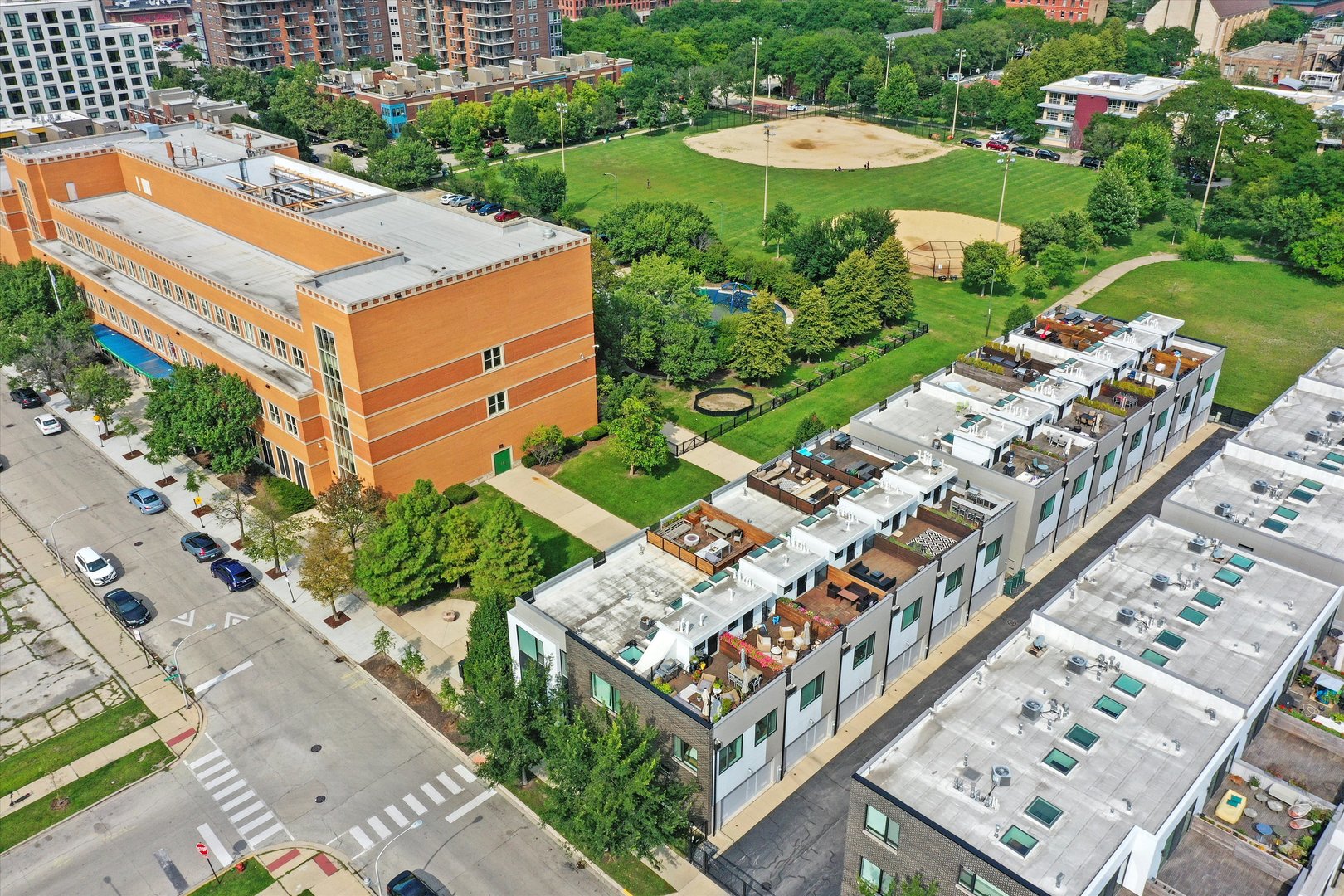 459 West Hobbie Street Chicago, IL 60610 - Photo 42 of 47 an aerial view of a house with a garden and trees