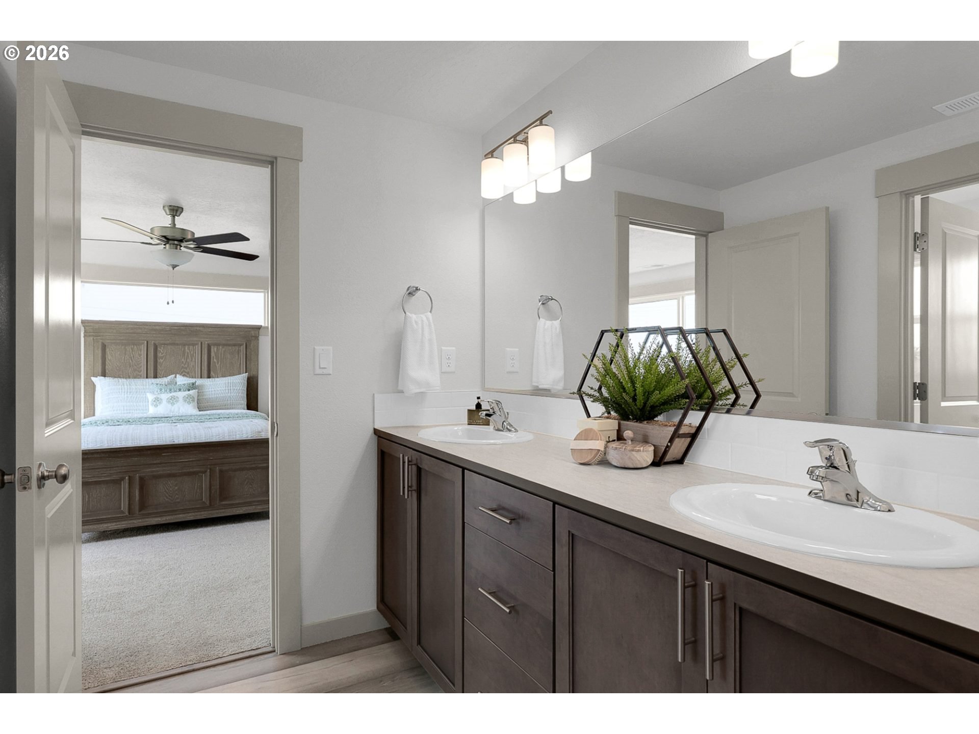 1018 South 52nd Street Springfield, OR 97478 - Photo 13 of 13 a bathroom with a double vanity sink and a mirror