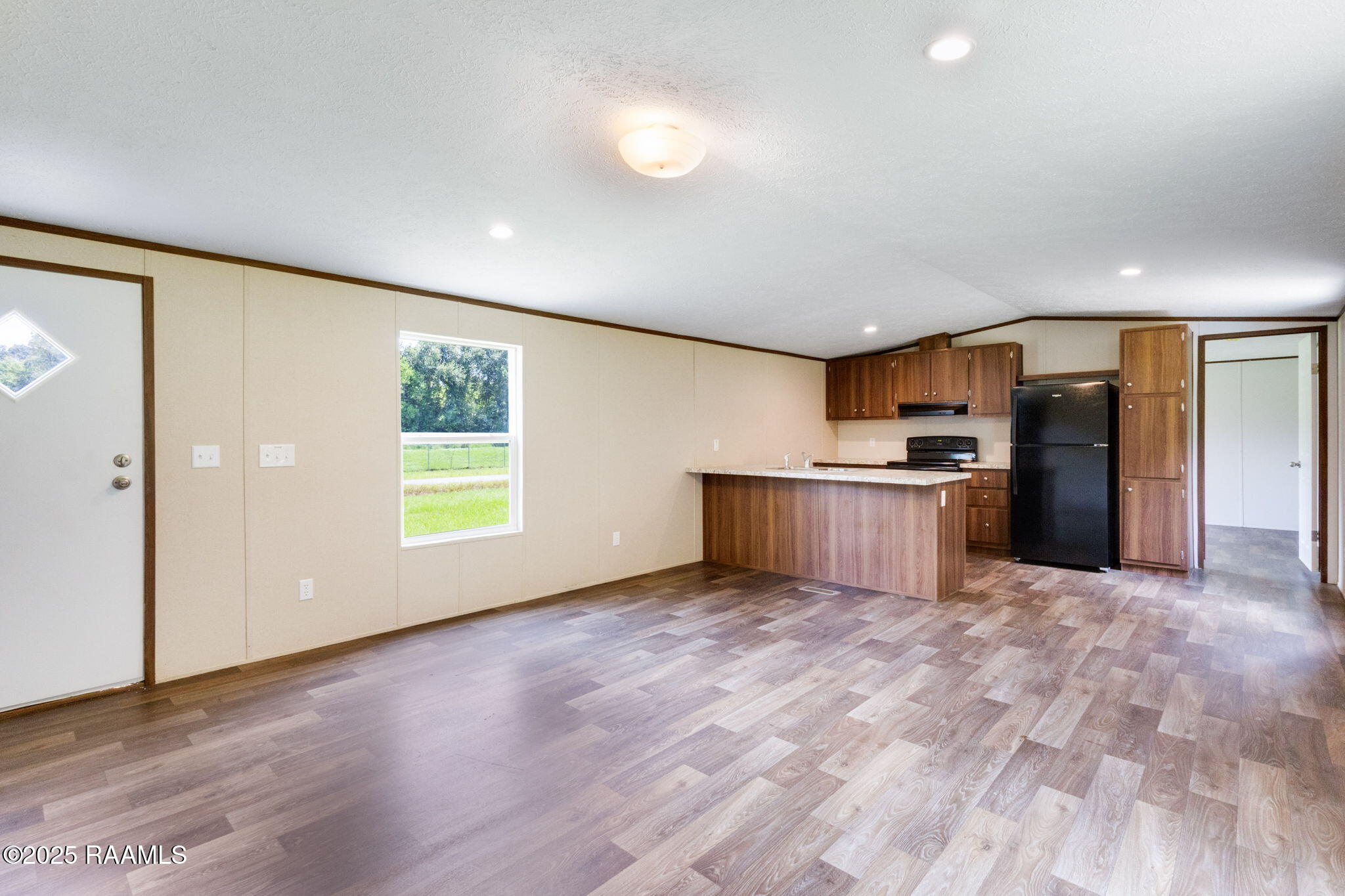 182 Talisman Street Opelousas, LA 70570 - Photo 4 of 18 Living/Kitchen