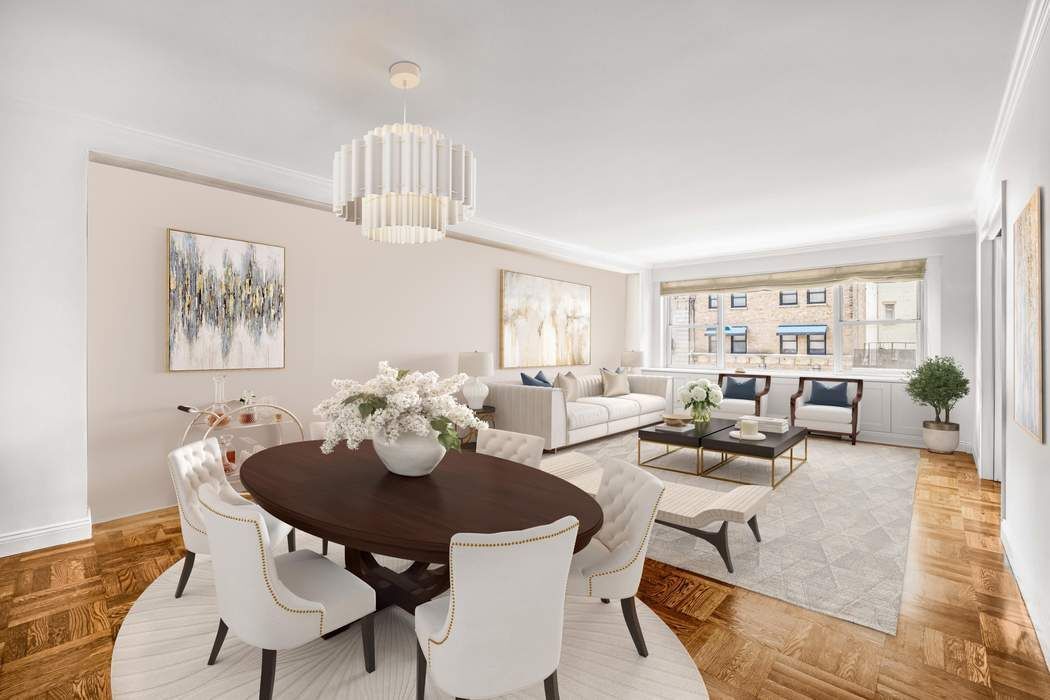 50 East 79th Street, Unit 5B Manhattan, NY 10075 - Photo 1 of 12 a view of a dining room with furniture and wooden floor