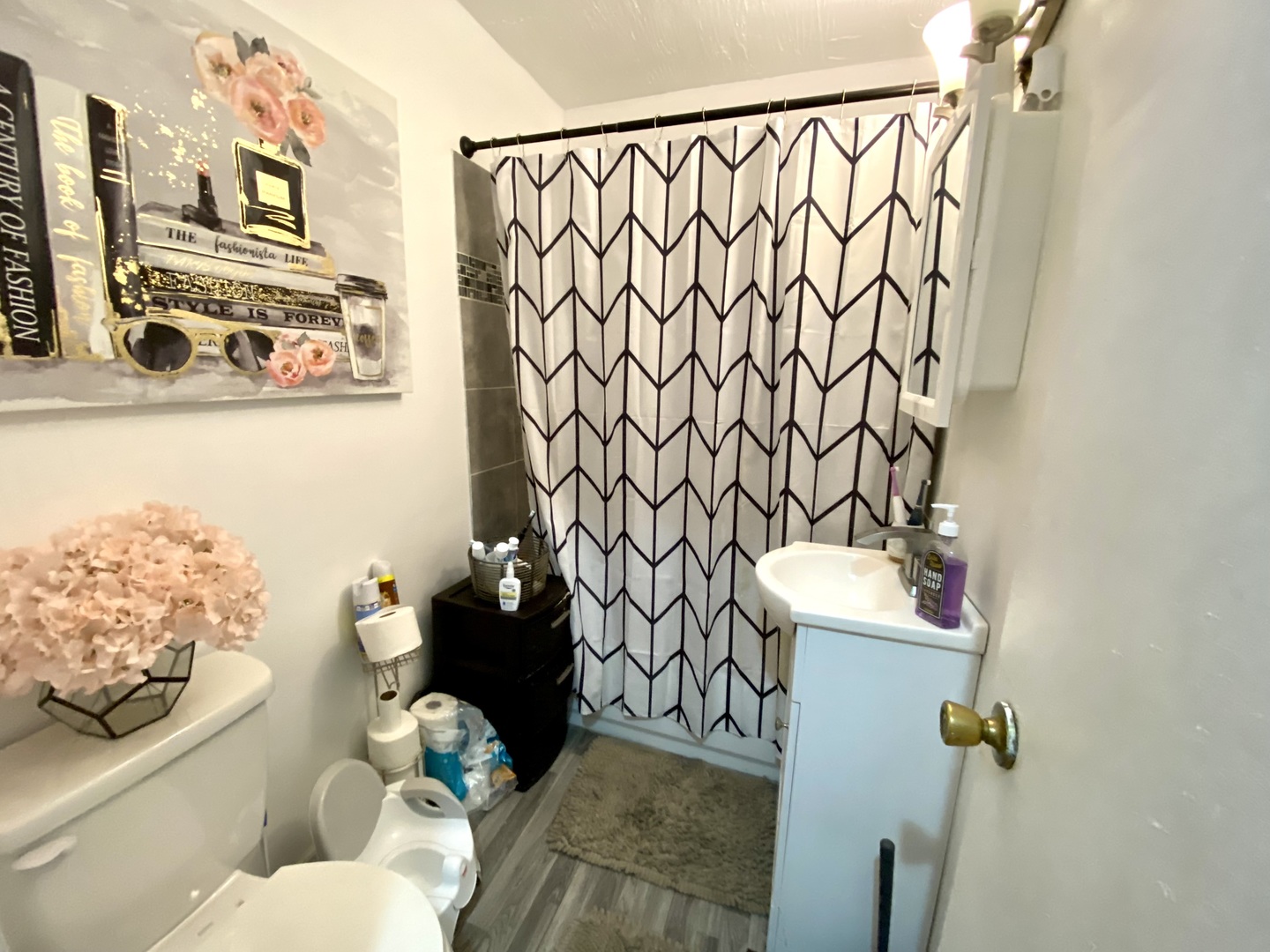 1124 West Cushing Street Decatur, IL 62526 - Photo 18 of 31 a bathroom with a toilet sink and mirror