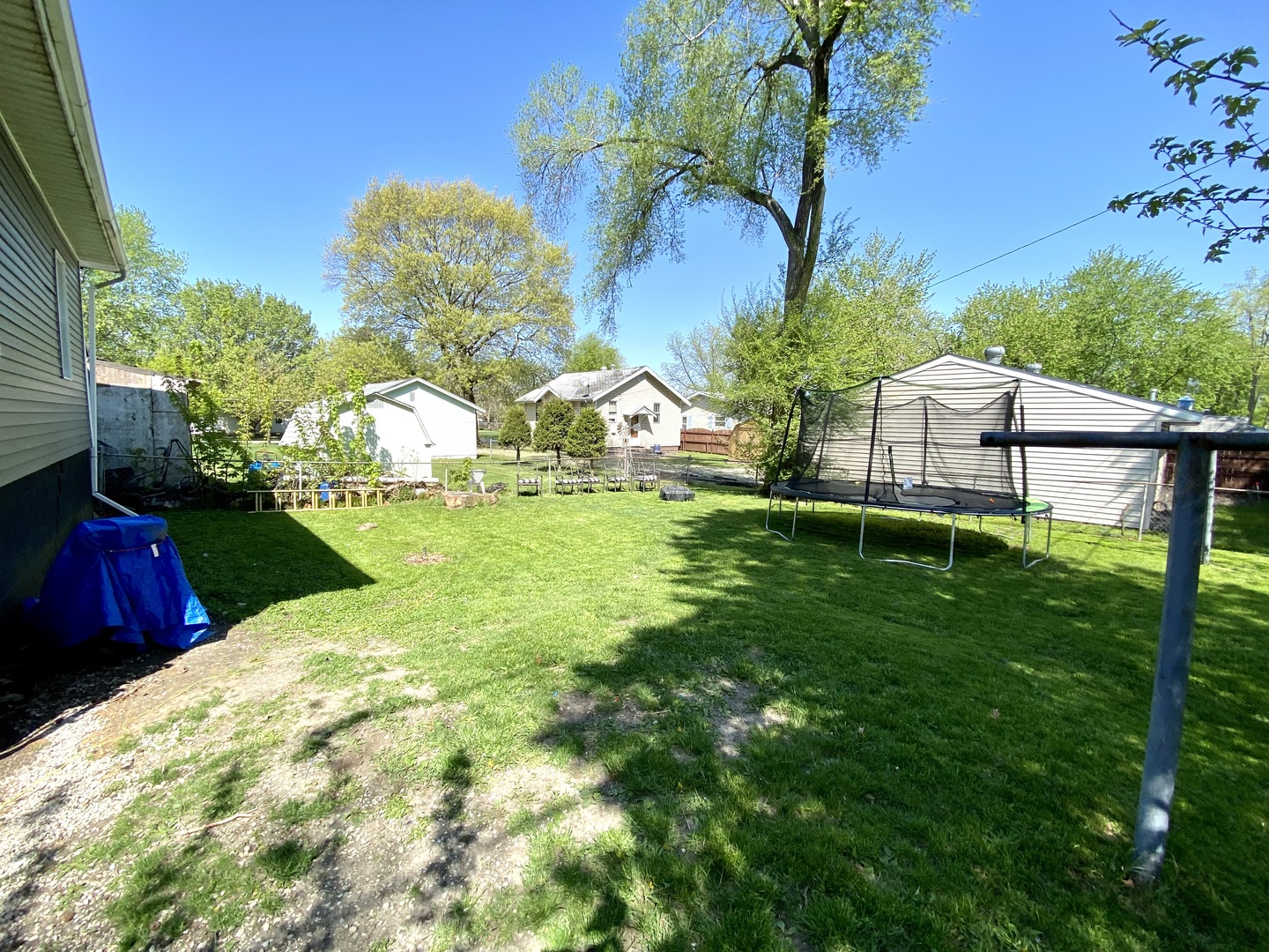 1124 West Cushing Street Decatur, IL 62526 - Photo 28 of 31 a view of a house with a backyard