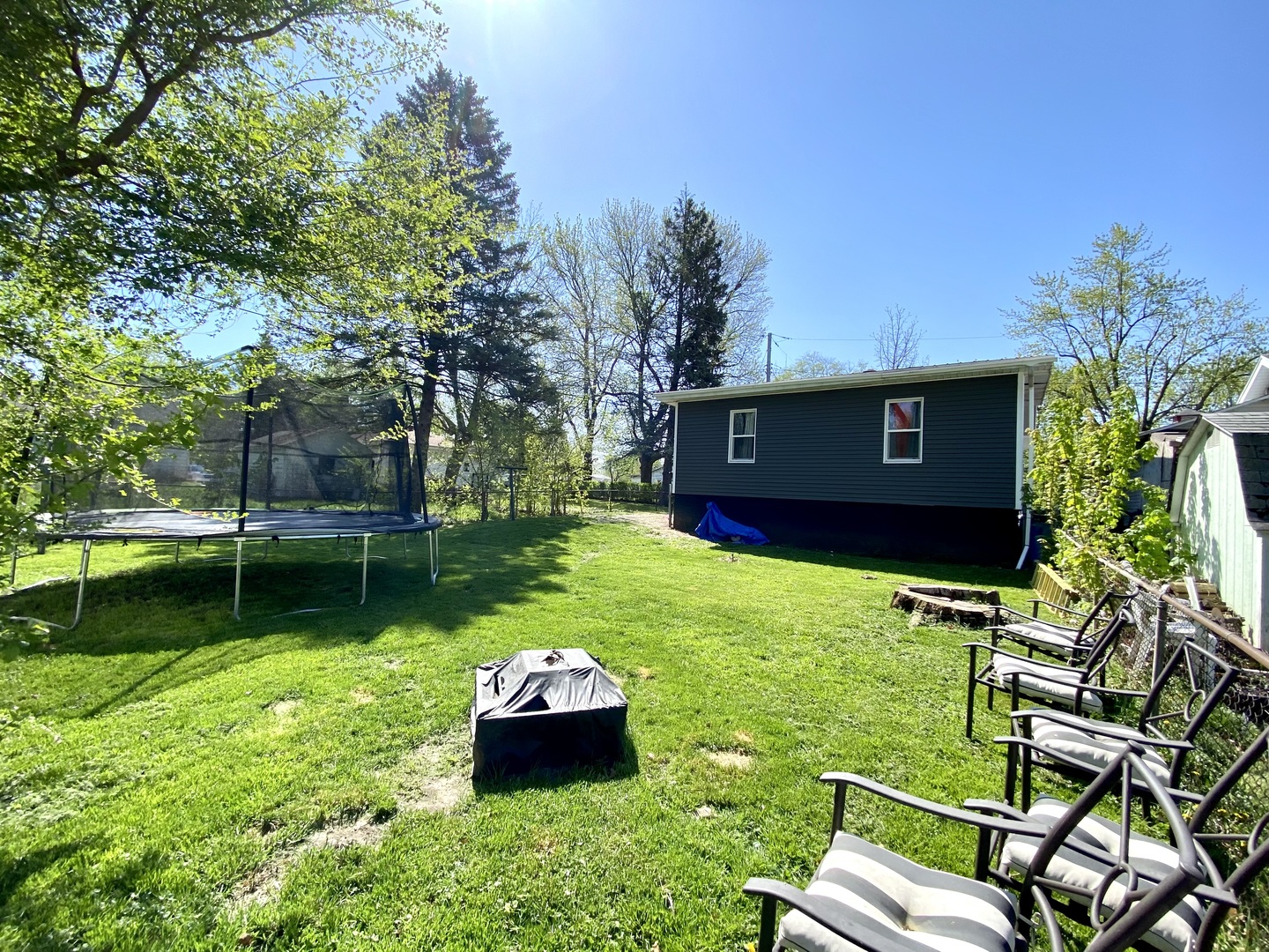 1124 West Cushing Street Decatur, IL 62526 - Photo 31 of 31 a view of a chair and table on the garden
