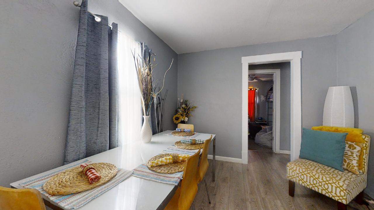 1124 West Cushing Street Decatur, IL 62526 - Photo 5 of 31 a living room with furniture and a window