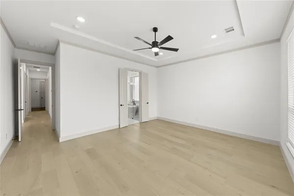 an empty room with fan