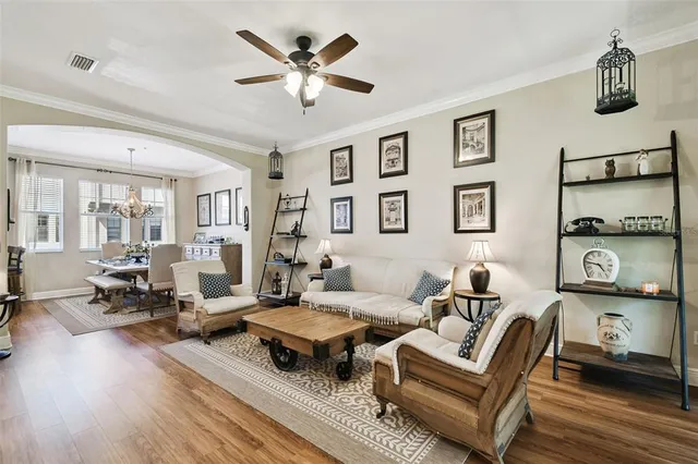 a living room with furniture and a window