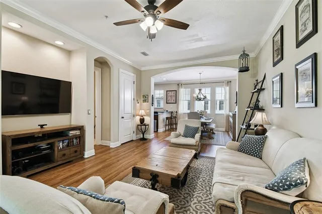 a view of a balcony with chair and white walls