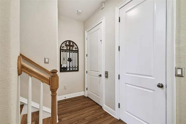 a view of a balcony with wooden floor