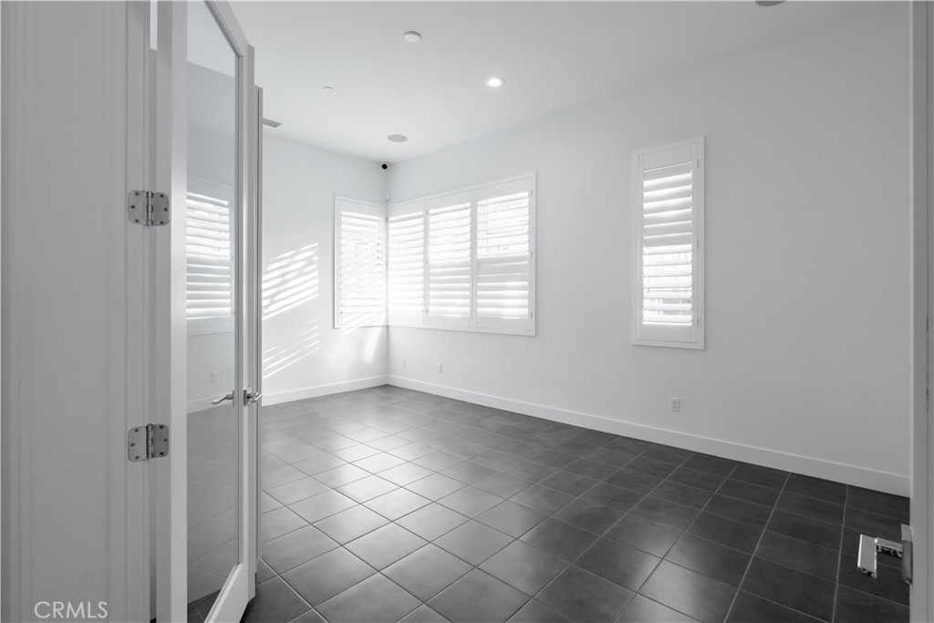 20043 Mersey Lane Porter Ranch, CA 91326 - Photo 20 of 68 a view of an empty room with a window
