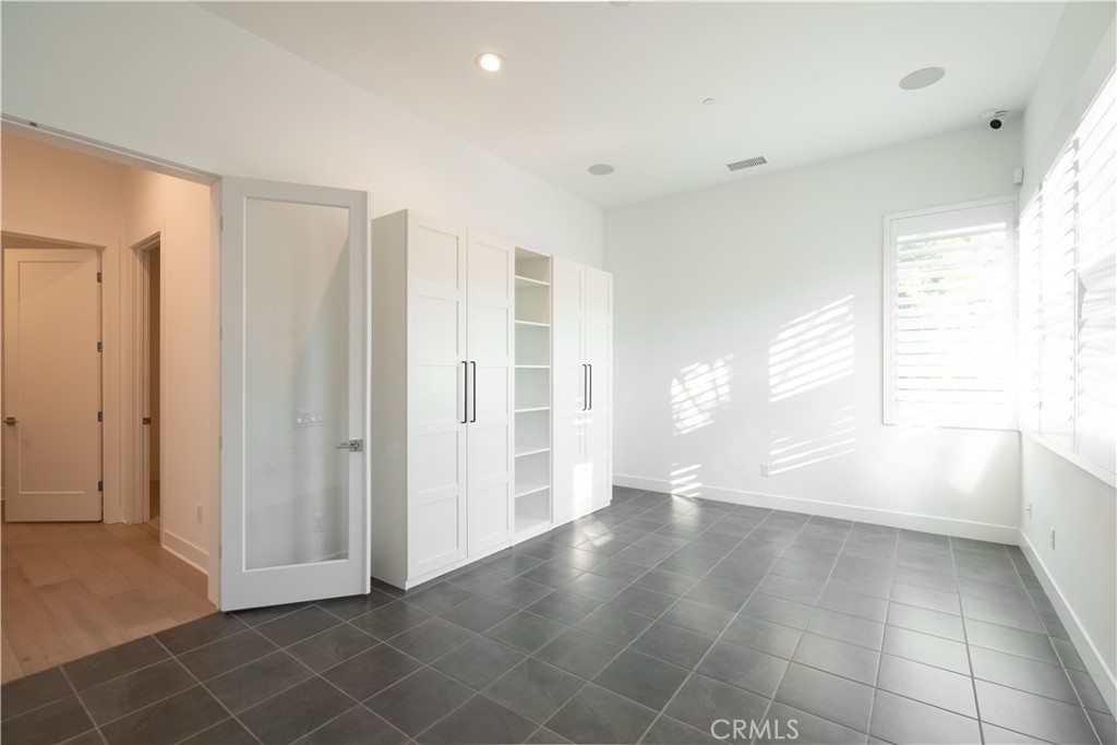 20043 Mersey Lane Porter Ranch, CA 91326 - Photo 22 of 68 a view of an empty room with a window
