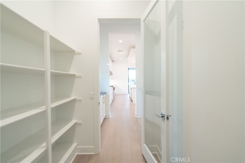 20043 Mersey Lane Porter Ranch, CA 91326 - Photo 28 of 68 a view of a bathroom from a hallway