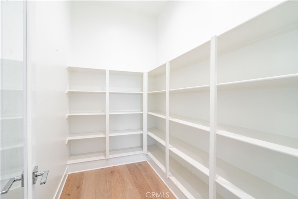 20043 Mersey Lane Porter Ranch, CA 91326 - Photo 29 of 68 a view of a room with empty racks