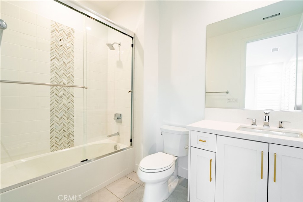 20043 Mersey Lane Porter Ranch, CA 91326 - Photo 46 of 68 a bathroom with a sink toilet and shower
