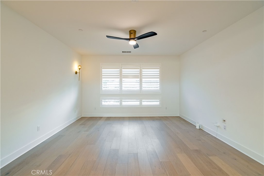 20043 Mersey Lane Porter Ranch, CA 91326 - Photo 48 of 68 wooden floor in an empty room with a window