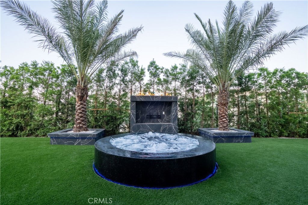 20043 Mersey Lane Porter Ranch, CA 91326 - Photo 62 of 68 a view of a house with garden and trees