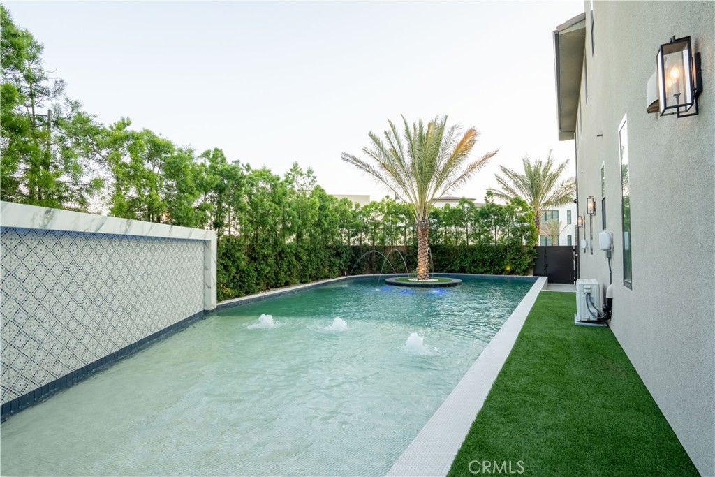 20043 Mersey Lane Porter Ranch, CA 91326 - Photo 65 of 68 a view of a backyard with a plants