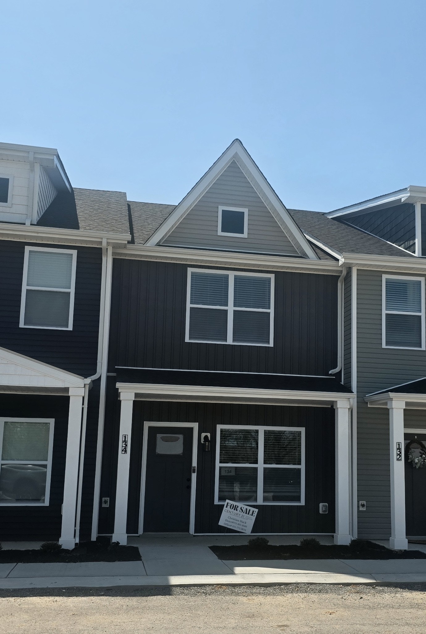 a front view of a house with a garage