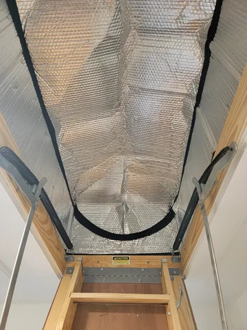 a view of balcony with wooden floor and stairs