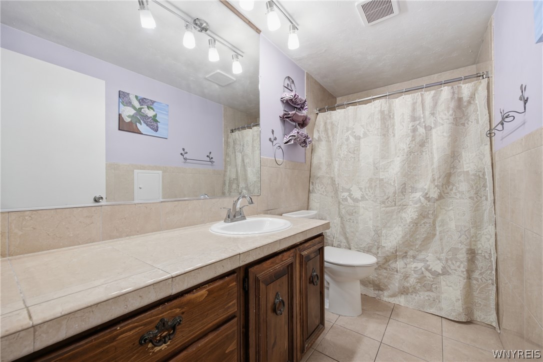 1635 Brant North Collins Road Brant, NY 14111 - Photo 26 of 36 Bathroom near other three bedrooms