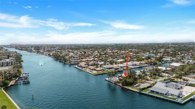 an aerial view of a city with water view