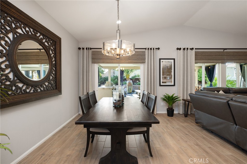 29981 Western Front Drive Menifee, CA 92584 - Photo 27 of 74 a view of a dining room with furniture window and outside view