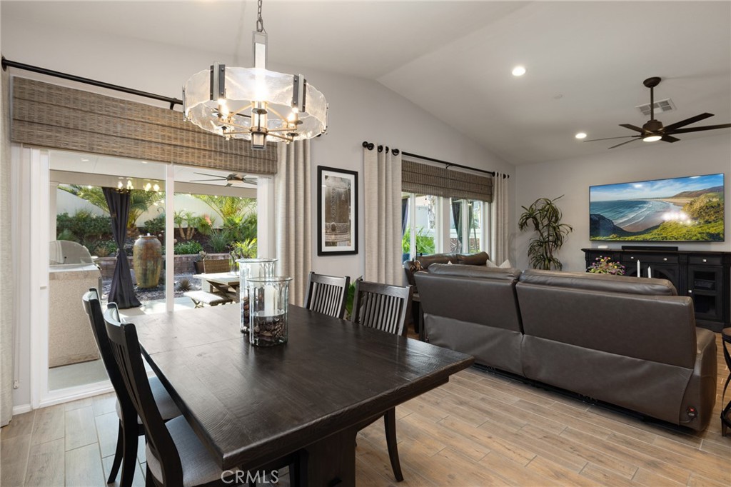 29981 Western Front Drive Menifee, CA 92584 - Photo 28 of 74 a view of a dining room with furniture window and wooden floor