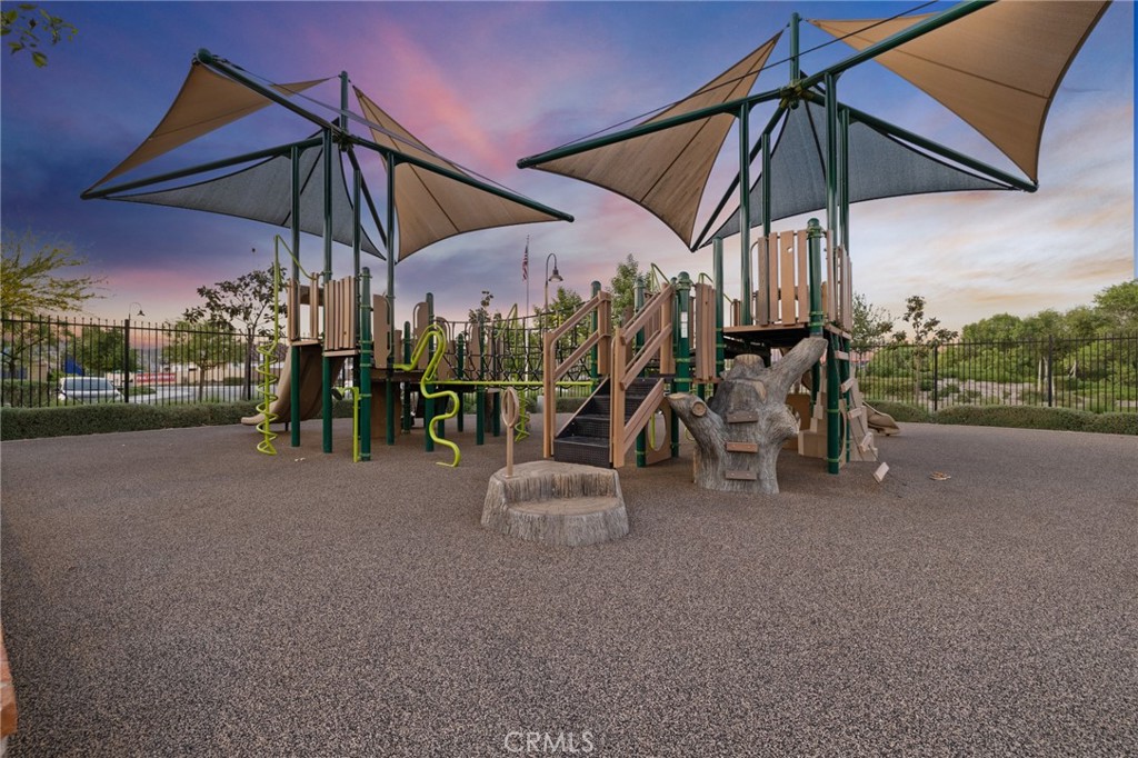 29981 Western Front Drive Menifee, CA 92584 - Photo 64 of 74 a view of a street with a patio