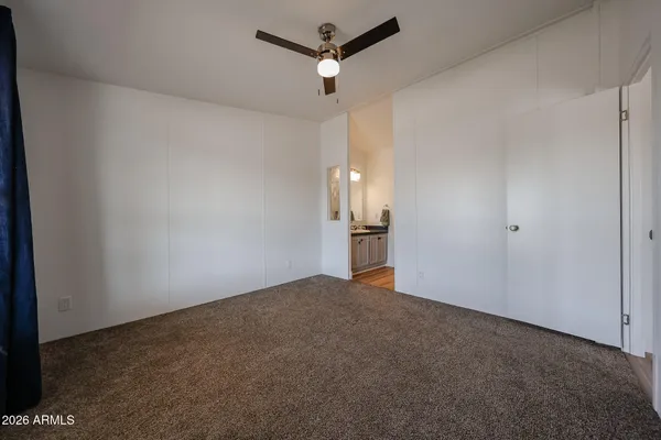 a bath room with a sink and a mirror