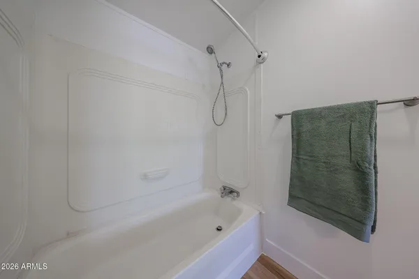 a view of storage and utility room with racks on the wall